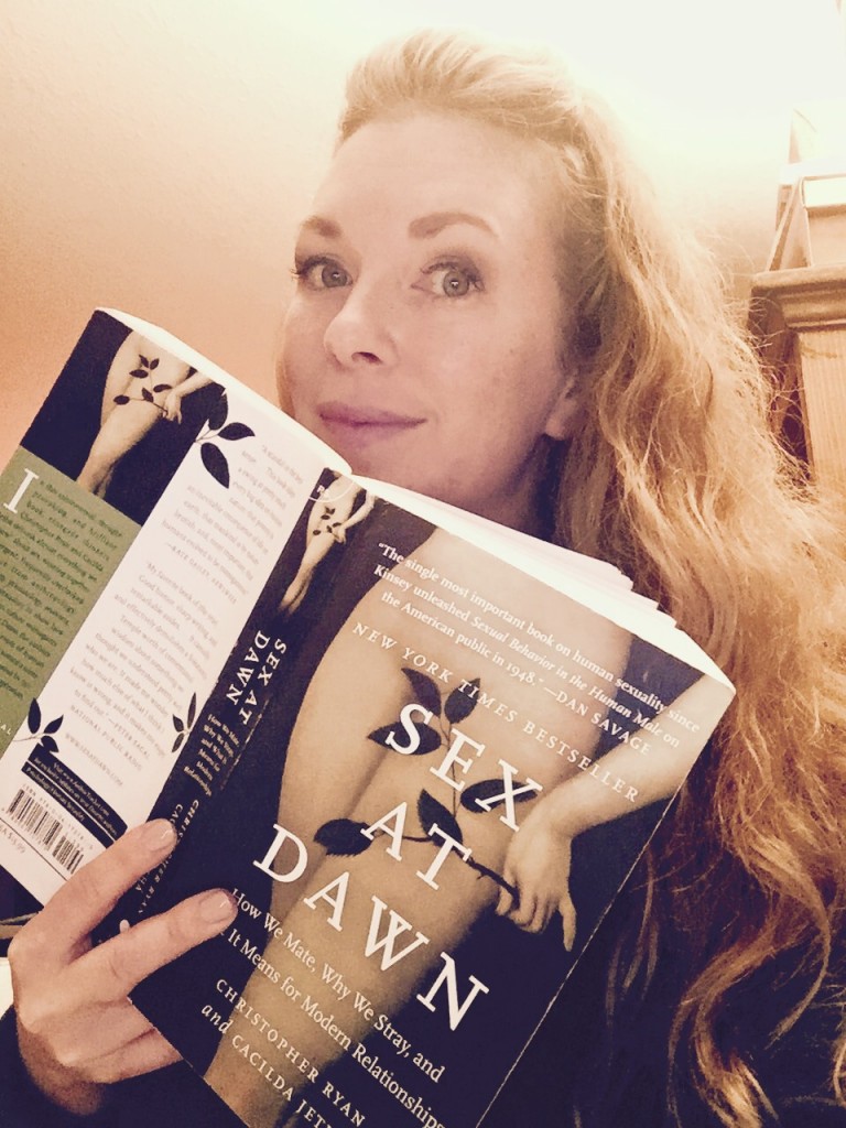 Mistress T with the book "Sex At Dawn".